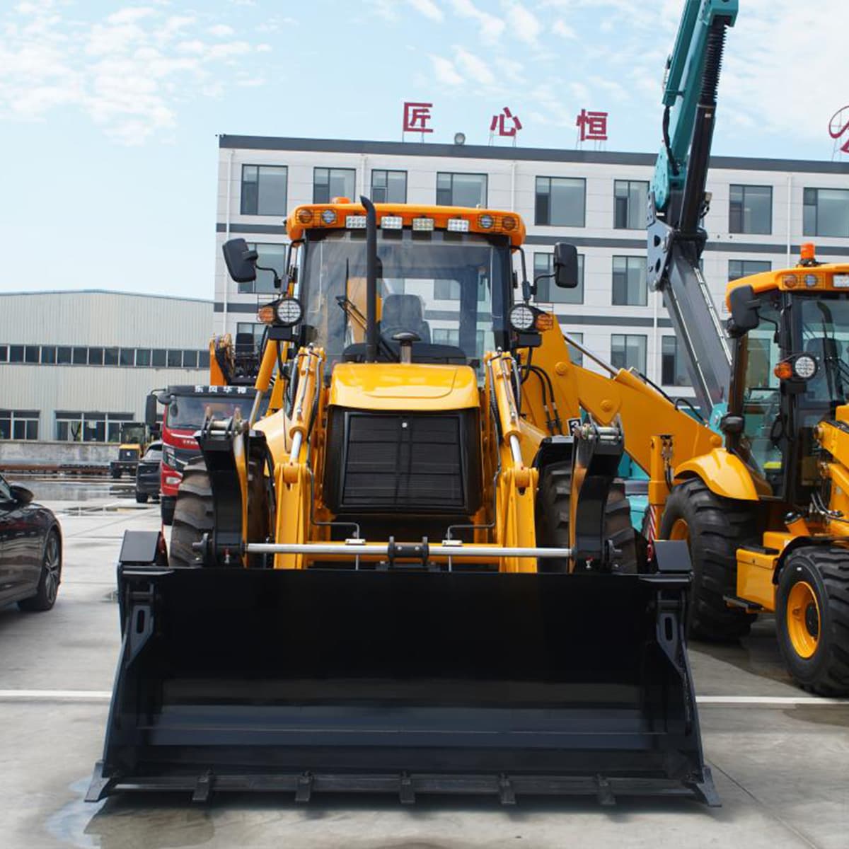 Колесный экскаватор-погрузчик